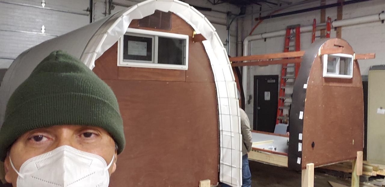 Abhik building tiny homes with Occupy Madison